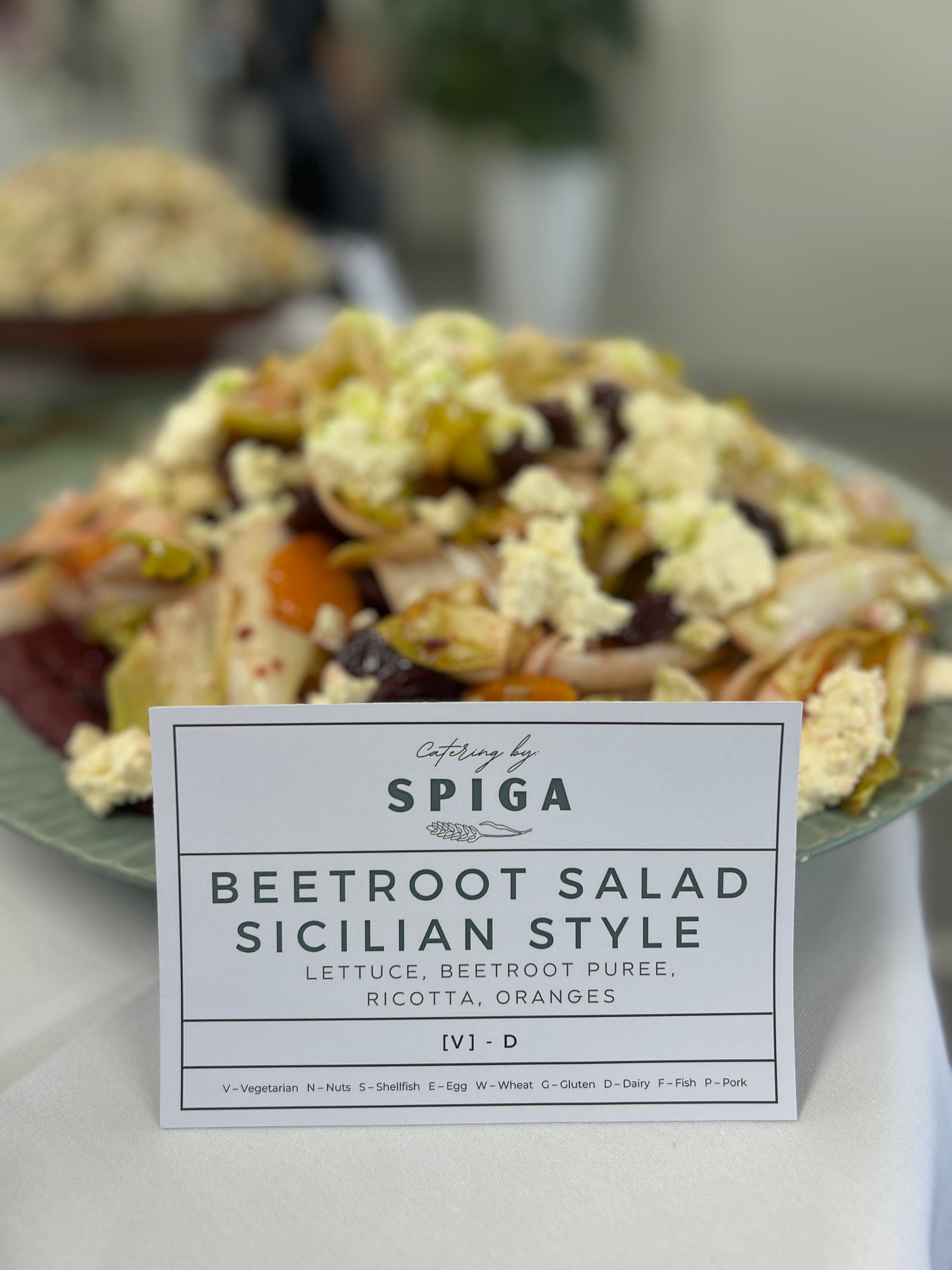 Beetroot salad Sicilian style with a Spiga label in the foreground